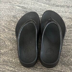 Oofos Black Flip Flops